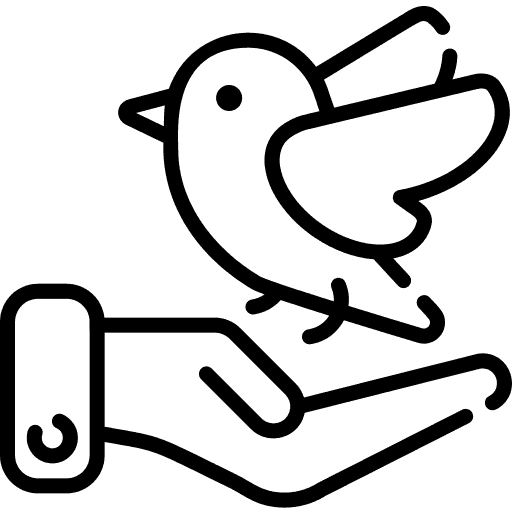 Vogel fliegt aus Hand. Symbol für Karriere, Freiheit und Freiraum.